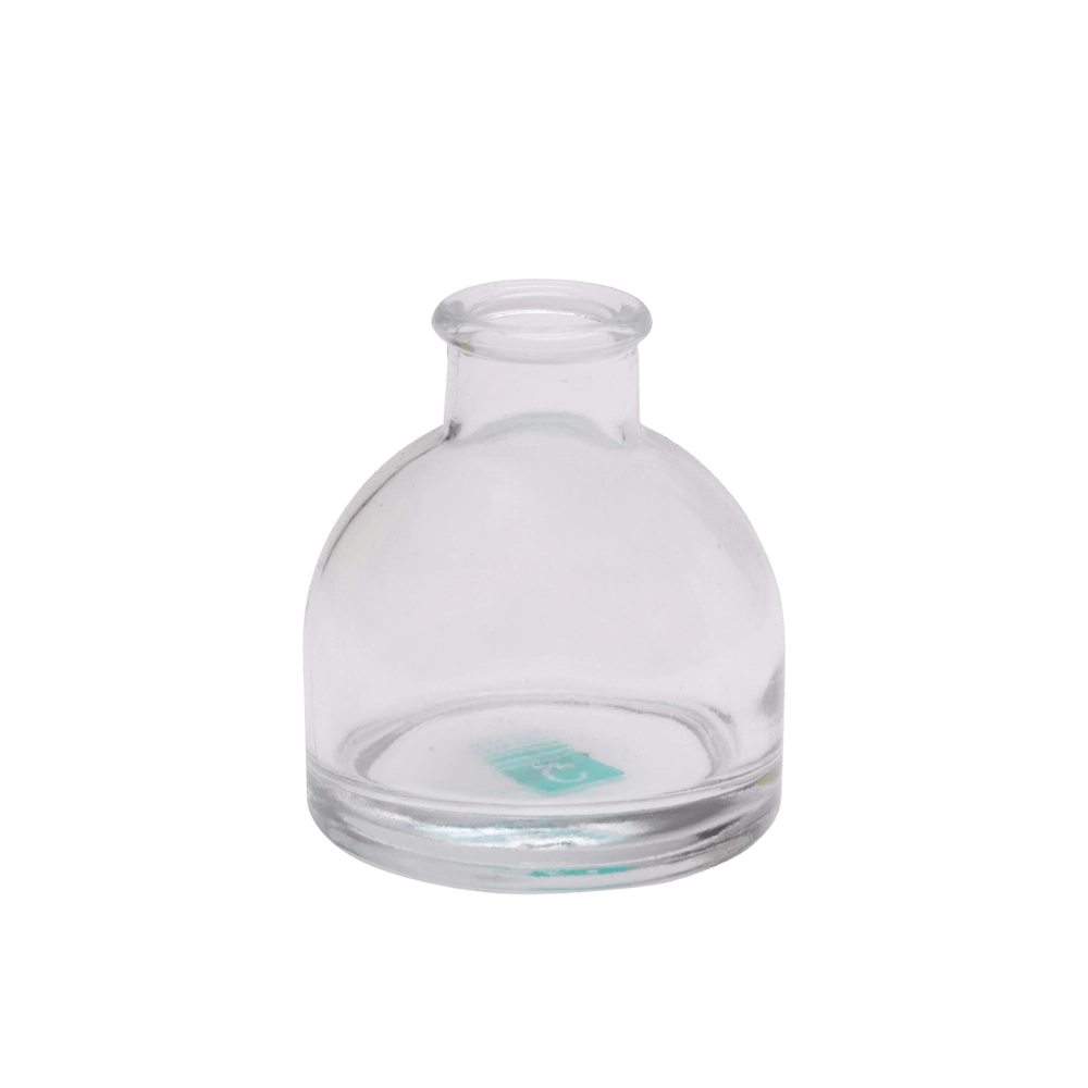 Chive Loft round glass bud vase in clear glass, shown straight-on with a smooth glossy finish.