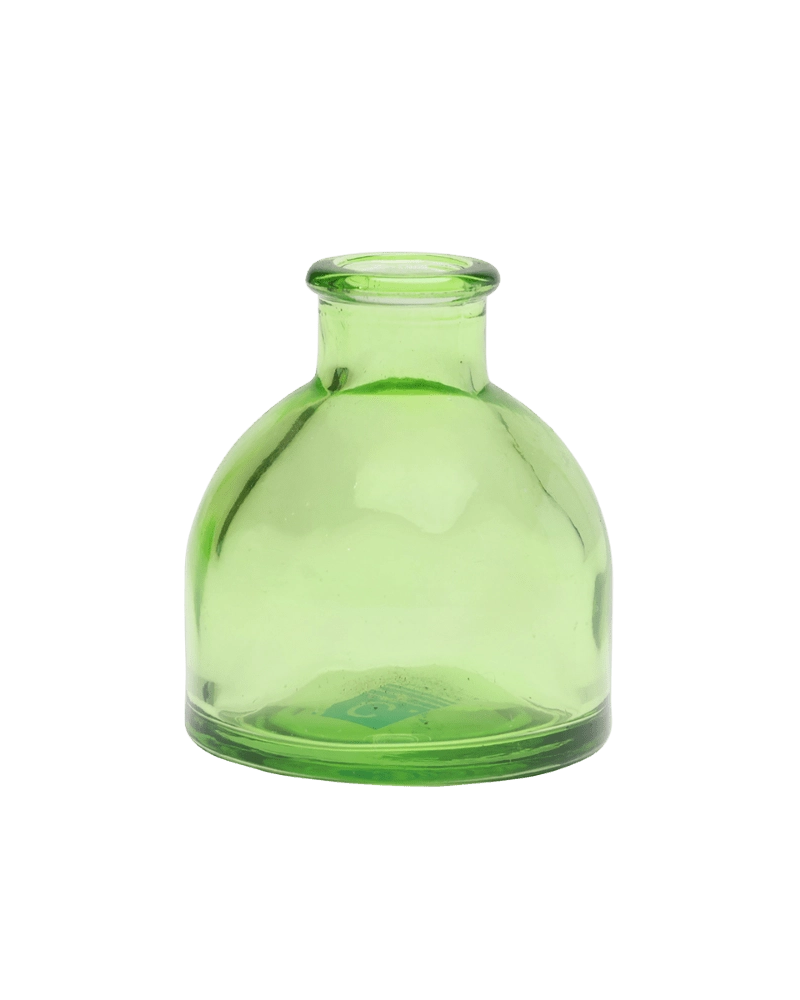 Chive Loft round glass bud vase in green with a domed silhouette and short neck.