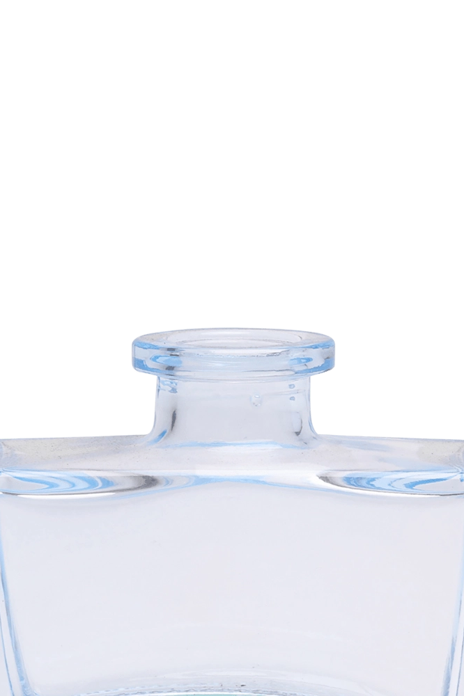 Chive Loft glass bud vase in Light Blue shows a close-up of the narrow neck and flared rim.
