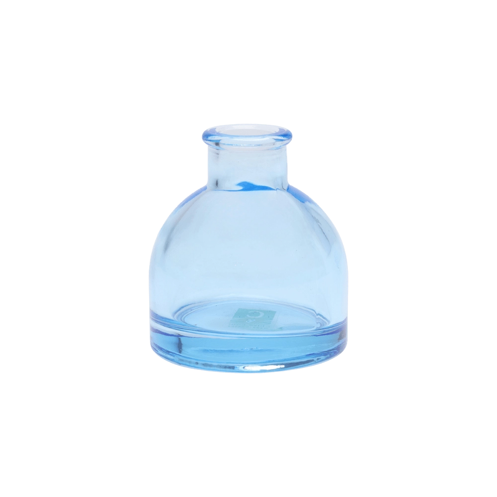 Chive Loft round glass bud vase in light blue, shown straight-on with a smooth glossy finish.