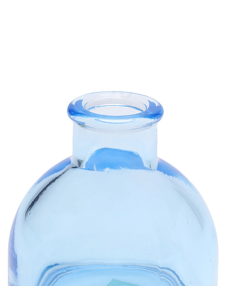 Chive Loft round glass bud vase in light blue, close-up on the flared neck and rim.