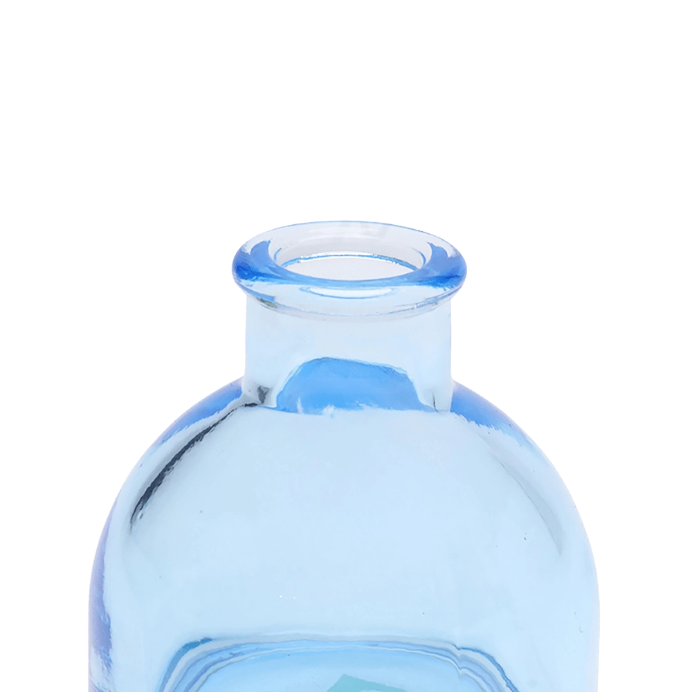 Chive Loft round glass bud vase in light blue, close-up on the flared neck and rim.