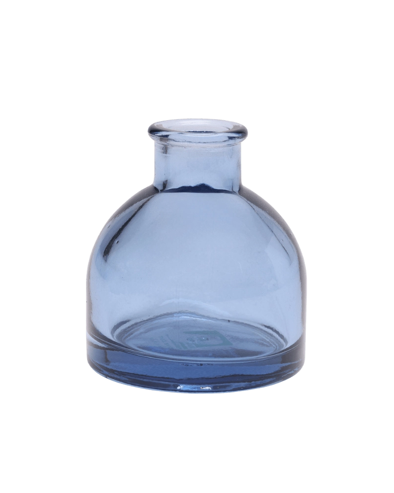 Chive Loft round glass bud vase in medium blue with a domed silhouette and short neck.