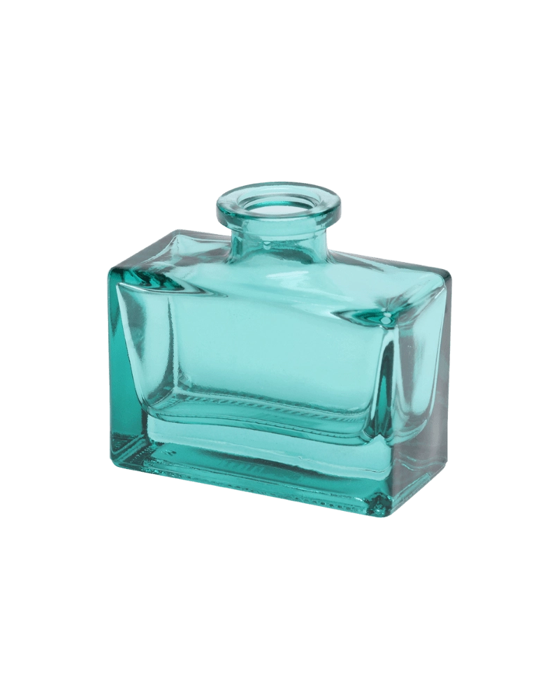 Chive Loft glass bud vase in Teal rotates to reveal the rectangular jar's angled corner detail.