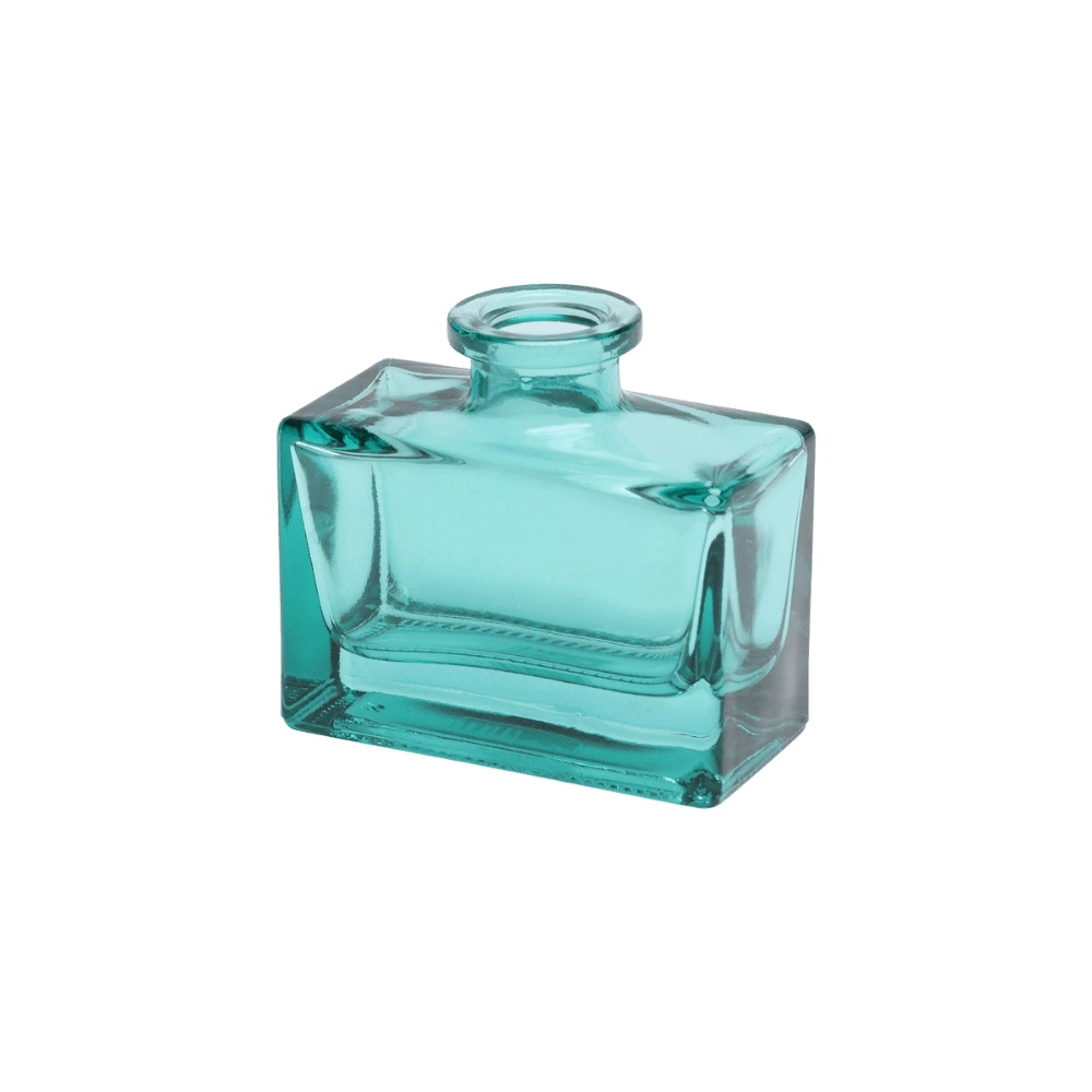 Chive Loft glass bud vase in Teal rotates to reveal the rectangular jar's angled corner detail.