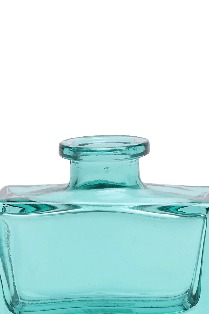Chive Loft glass bud vase in Teal shows a close-up of the narrow neck and flared rim.