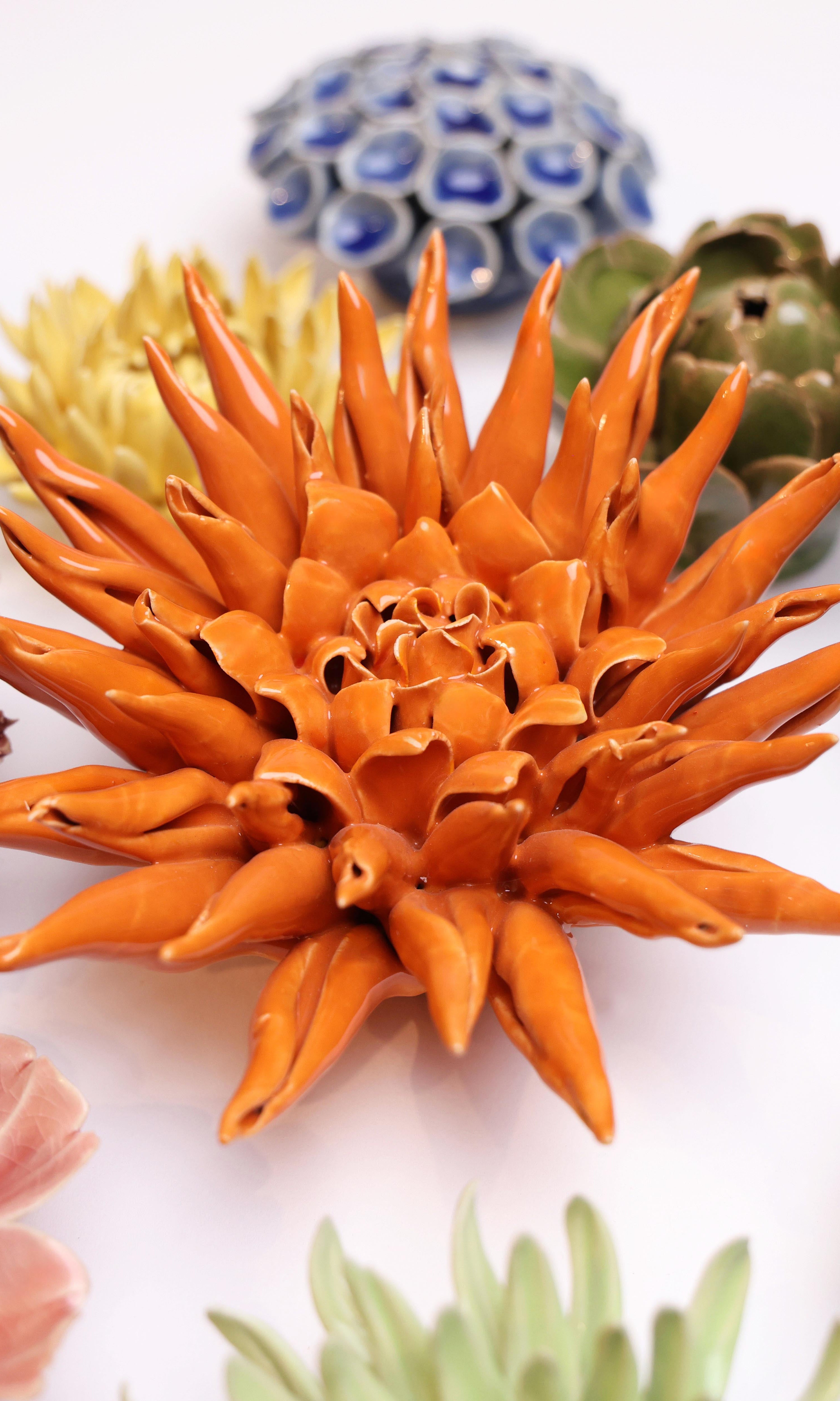 Ceramic Flower Large Orange 12 ceramic wall flower styled on wall — Classic Collection — Chive Studio Toronto