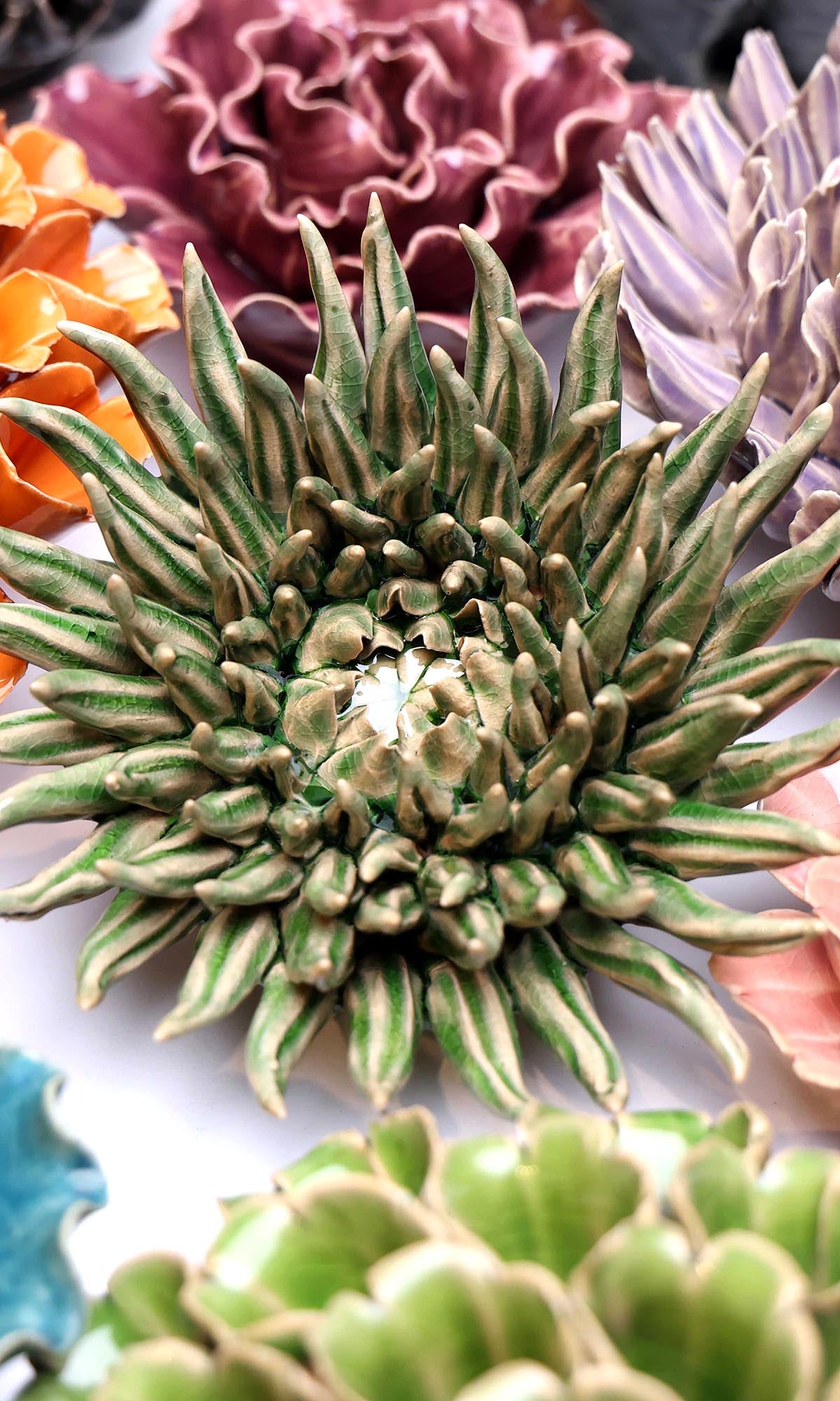 Olive Mum 5 ceramic wall flower styled on wall — Classic Collection — Chive Studio Toronto