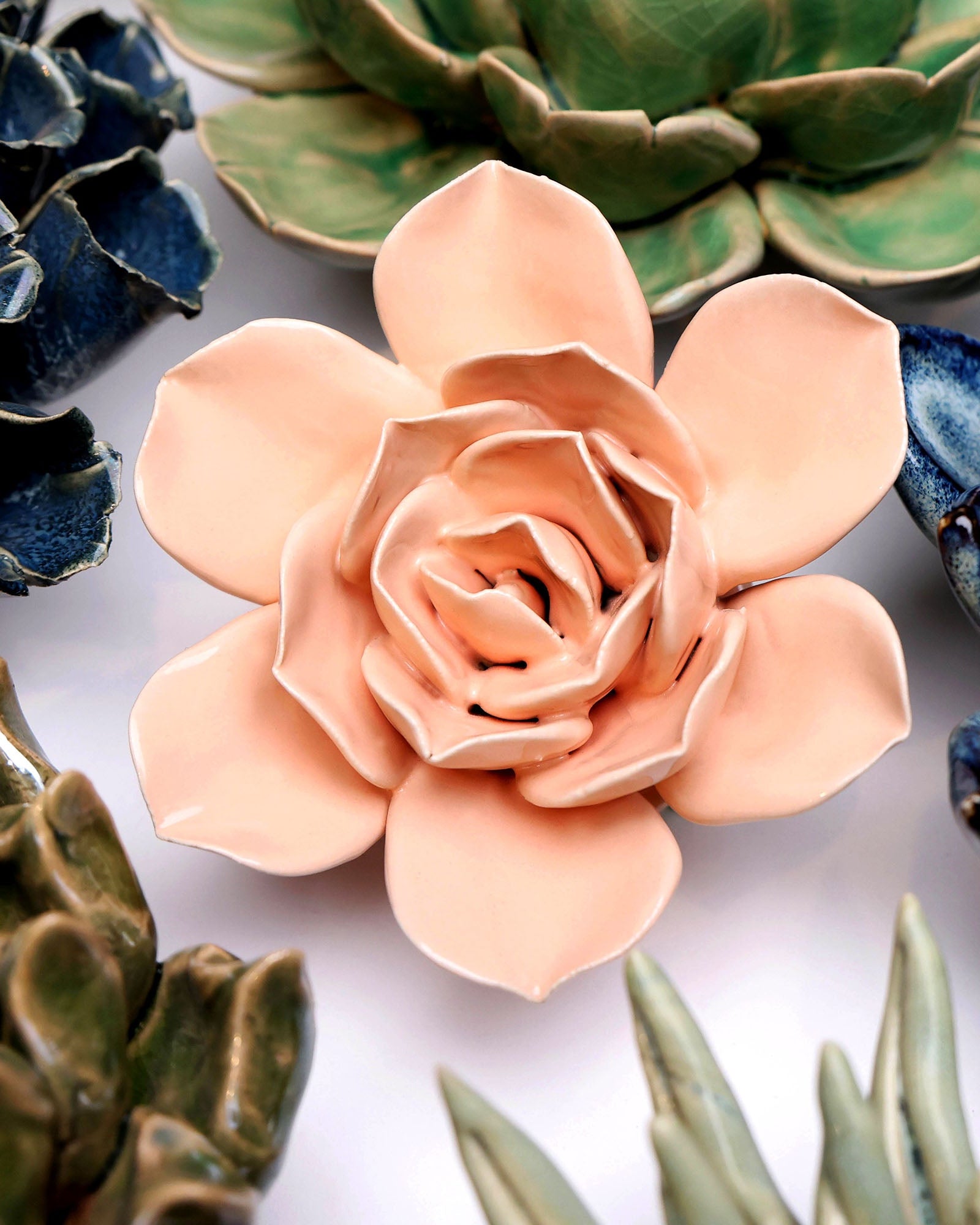 Apricot Pink Narcissus ceramic wall flower styled on wall — Classic Collection — Chive Studio Toronto