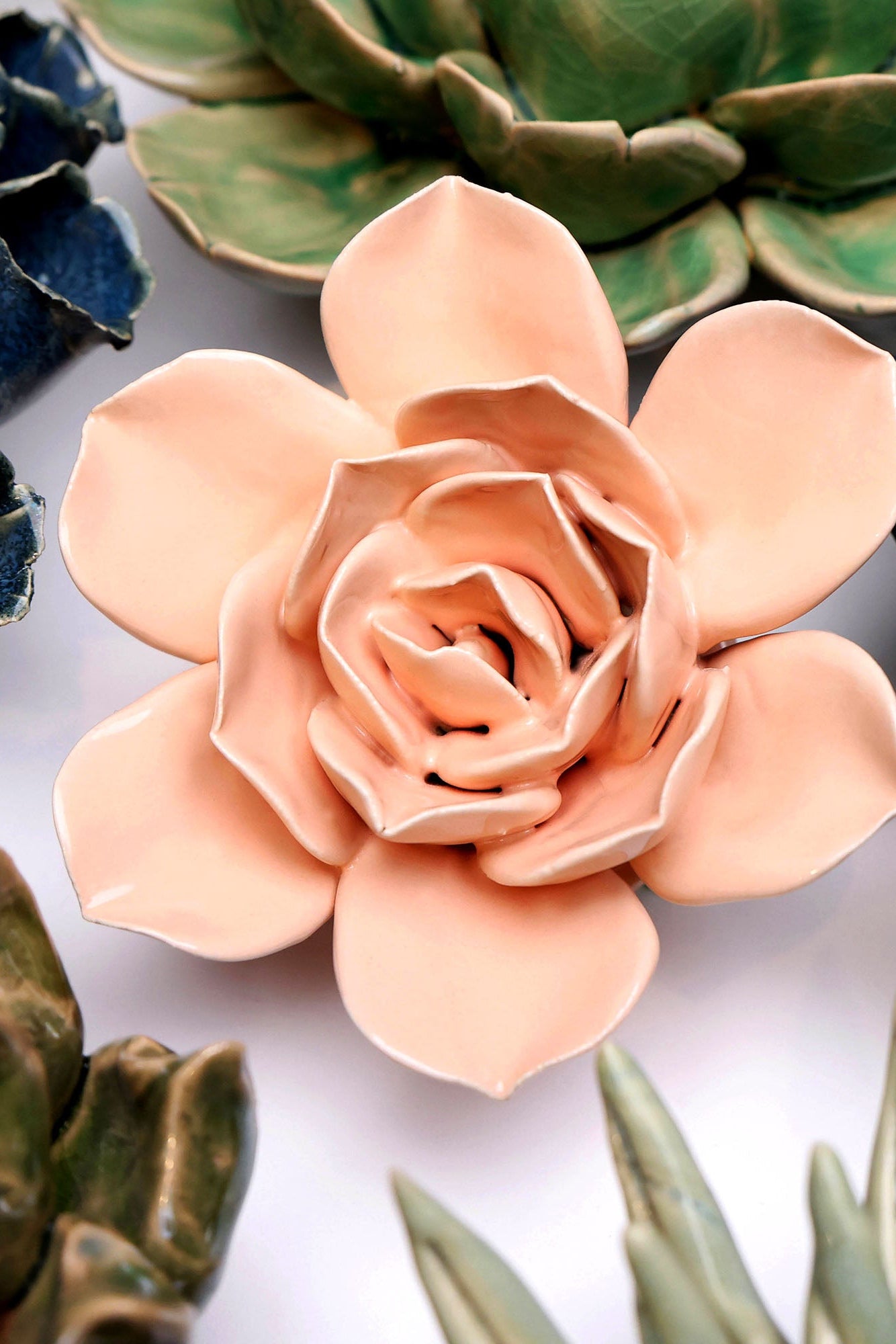 Apricot Pink Narcissus ceramic wall flower styled on wall — Classic Collection — Chive Studio Toronto