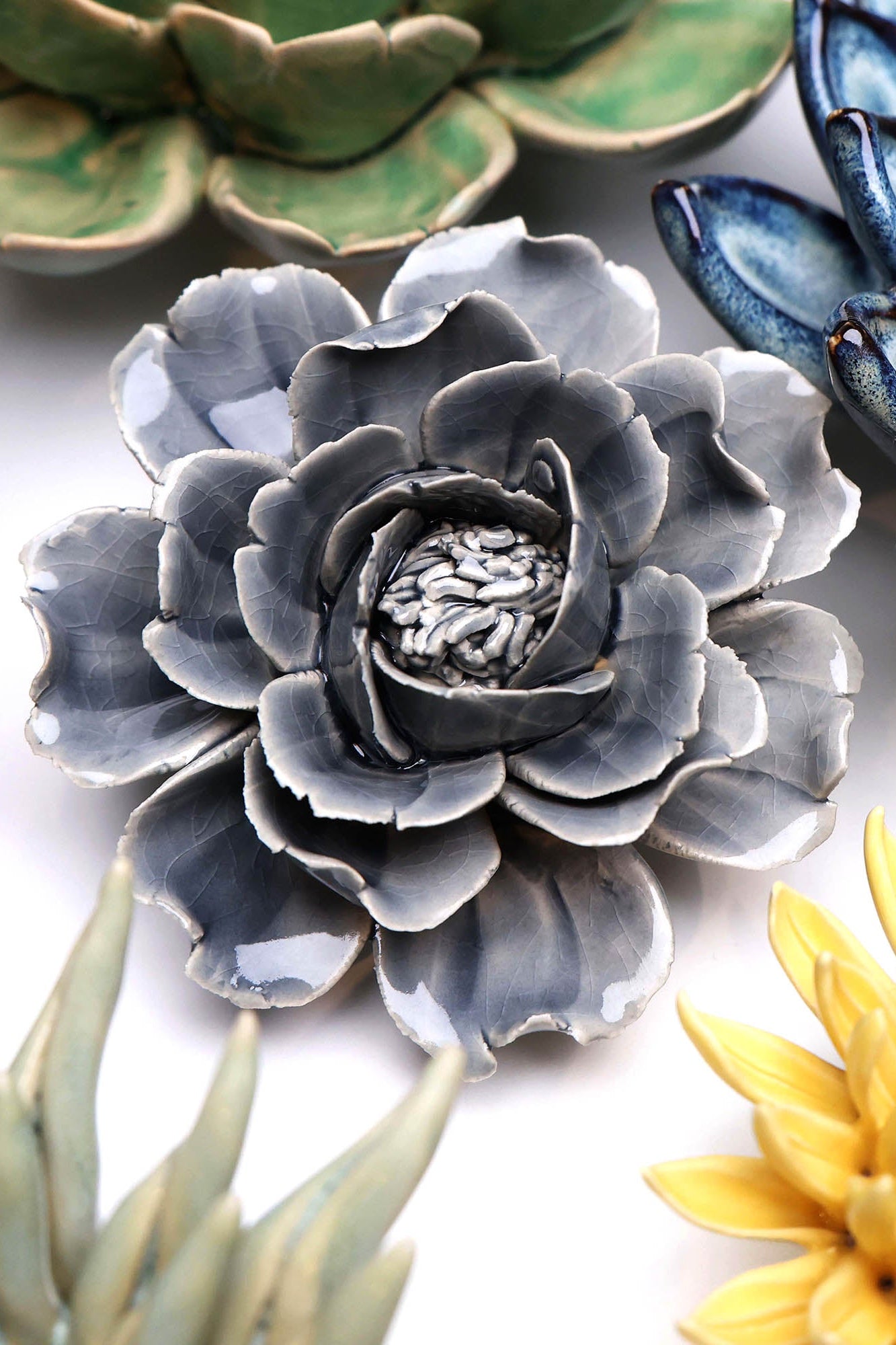 Rose Grey ceramic wall flower styled on wall — Classic Collection — Chive Studio Toronto