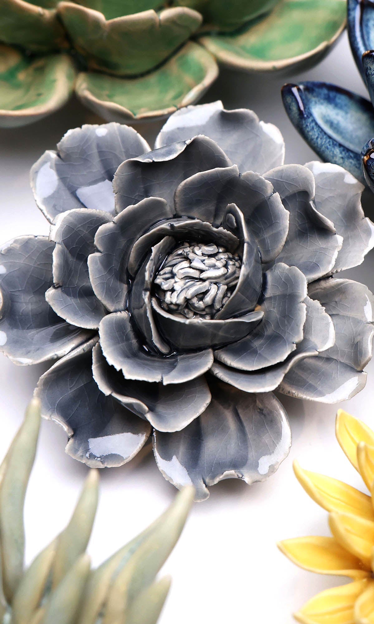 Rose Grey ceramic wall flower styled on wall — Classic Collection — Chive Studio Toronto