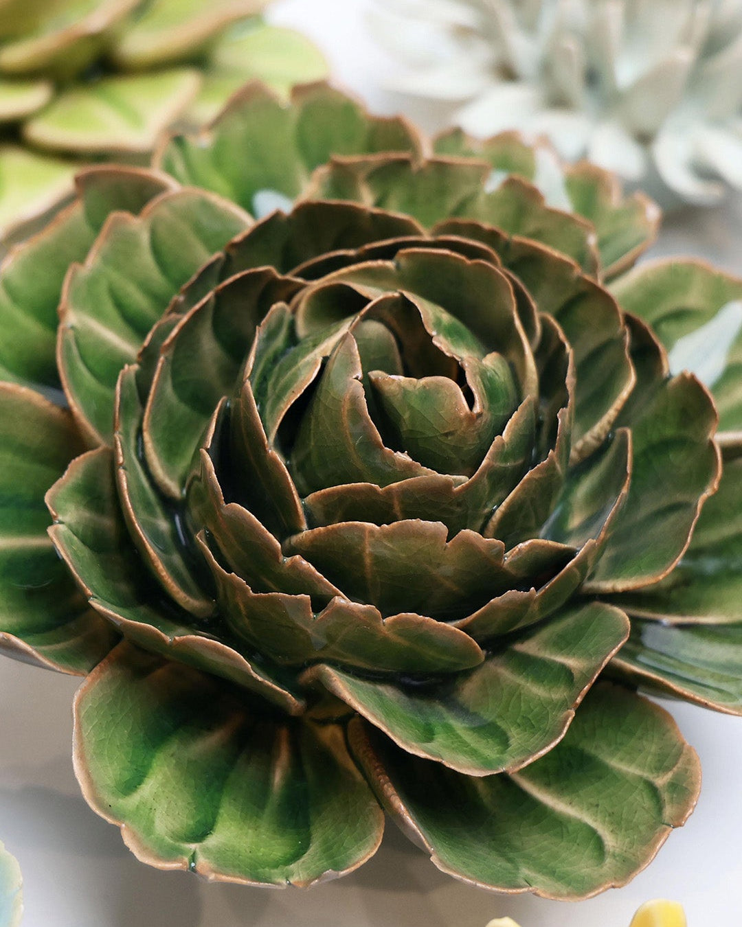 Avocado Green Rozella Peony ceramic wall flower styled on wall — English Garden — Chive Studio Toronto