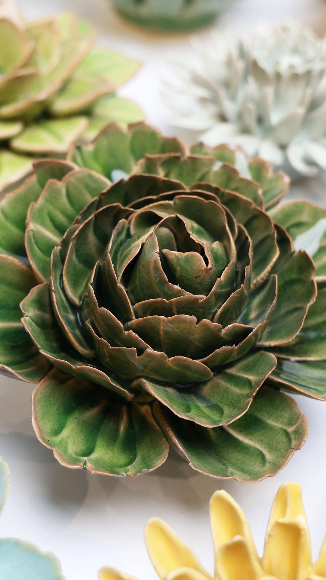 Avocado Green Rozella Peony ceramic wall flower styled on wall — English Garden — Chive Studio Toronto