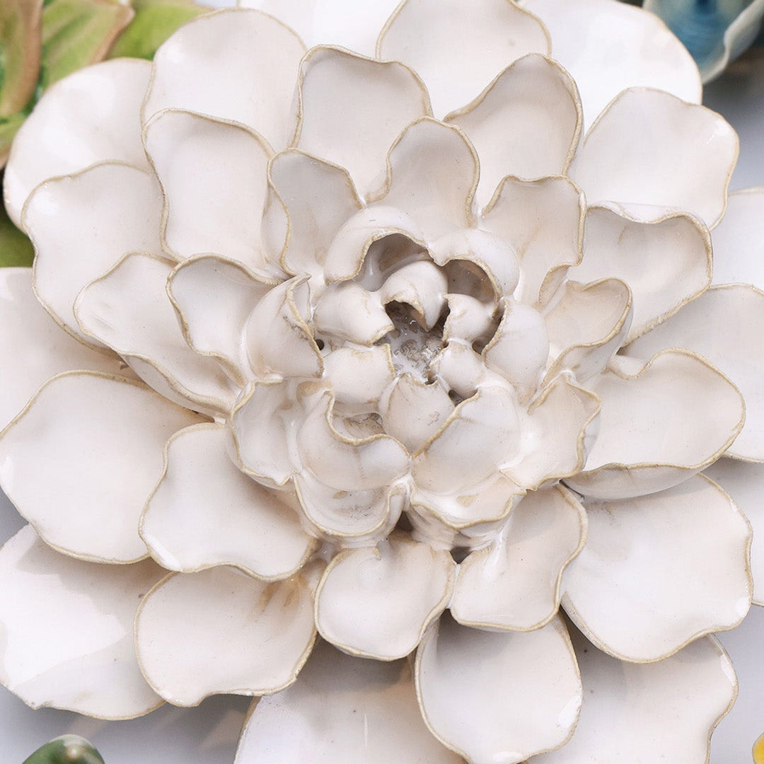 Ivory European Water Lily ceramic wall flower mounted on a wall — Chive Ceramics Studio