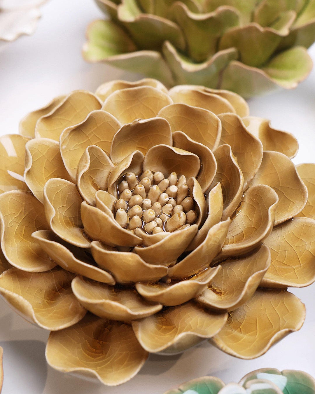 Caramel Charm Peony ceramic wall flower mounted on a wall — Chive Ceramics Studio