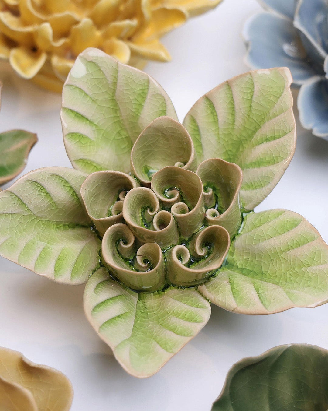 Peridot Green Maiden Lotus ceramic wall flower styled on wall — English Garden — Chive Studio Toronto