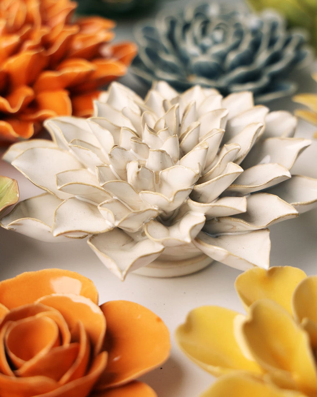 Ivory Autumn Azalea ceramic wall flower mounted on a wall — Chive Ceramics Studio