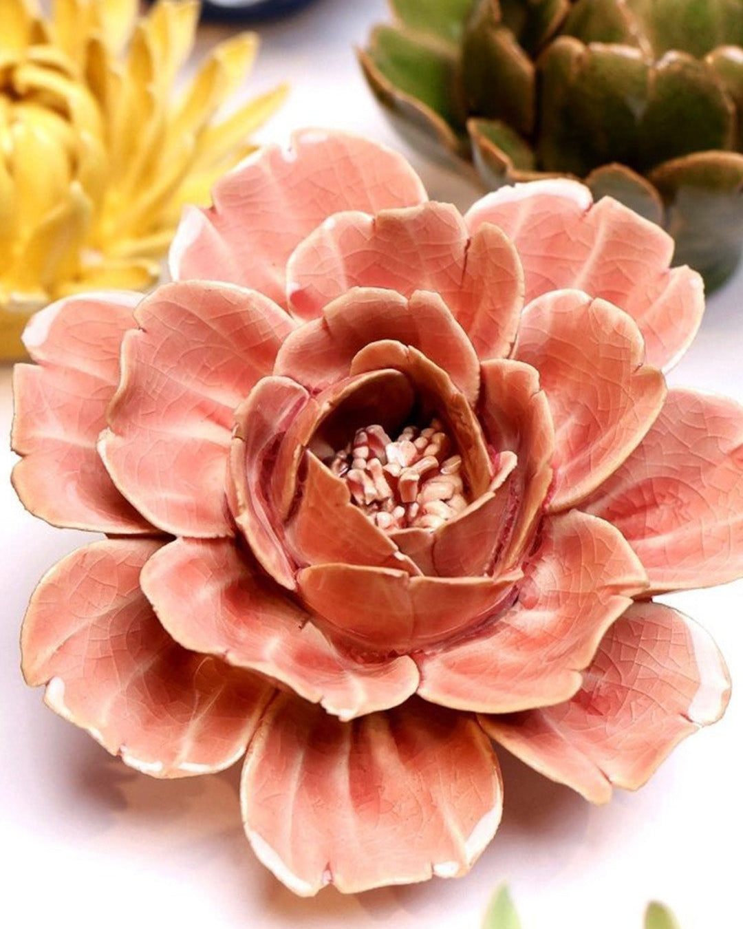Champagne Pink Rose ceramic wall flower styled on a white table with other flowers — Chive Studio
