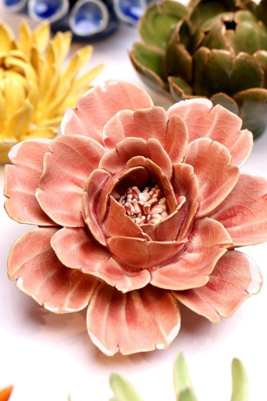 Champagne Pink Rose ceramic wall flower styled on a white table with other flowers — Chive Studio