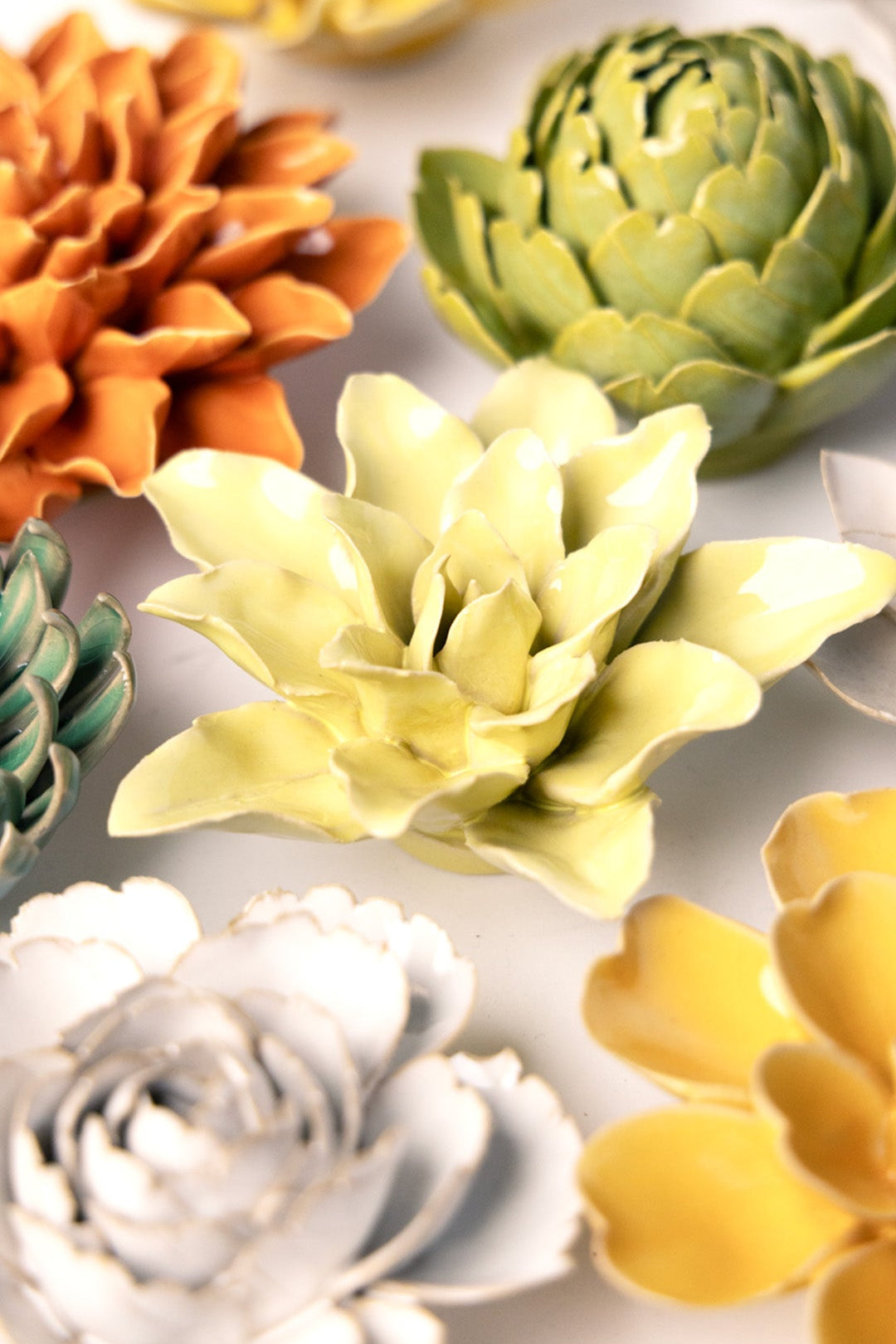 Lime Yellow Tiger Lily ceramic wall flower styled on wall — English Garden — Chive Studio Toronto