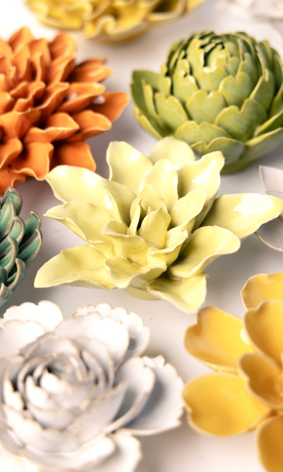 Lime Yellow Tiger Lily ceramic wall flower styled on wall — English Garden — Chive Studio Toronto
