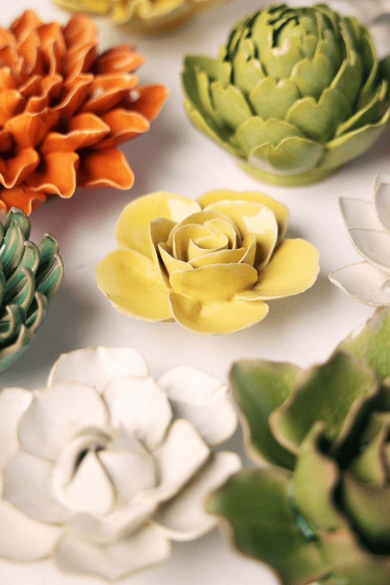Buttercup Yellow Elegance Ranunculus ceramic wall flower styled on wall — English Garden — Chive Studio Toronto