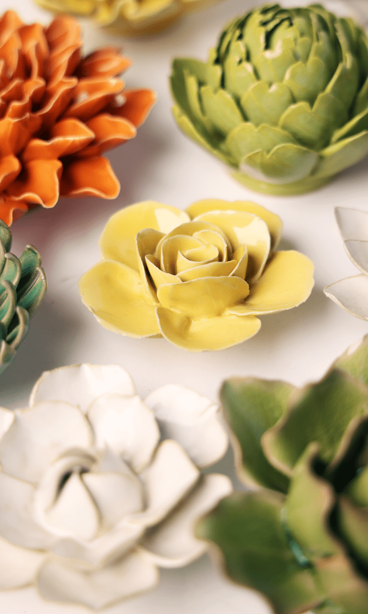 Buttercup Yellow Elegance Ranunculus ceramic wall flower styled on wall — English Garden — Chive Studio Toronto
