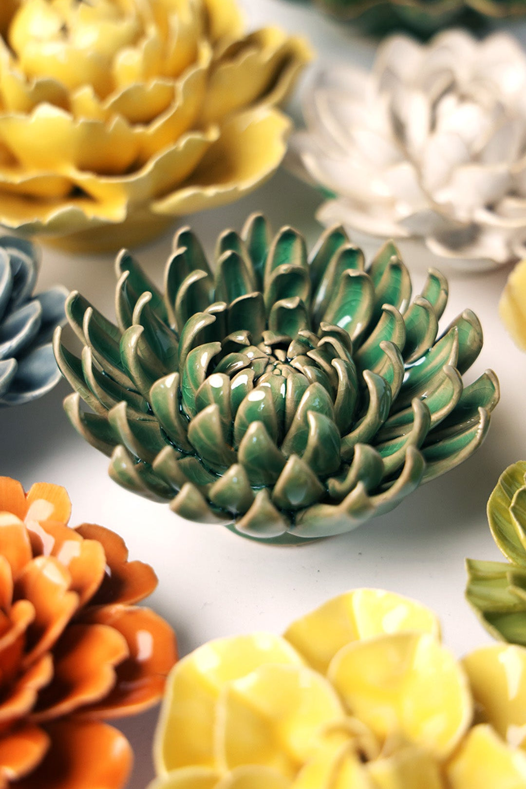 Jungle Green Pompom Mum ceramic wall flower styled on wall — English Garden — Chive Studio Toronto