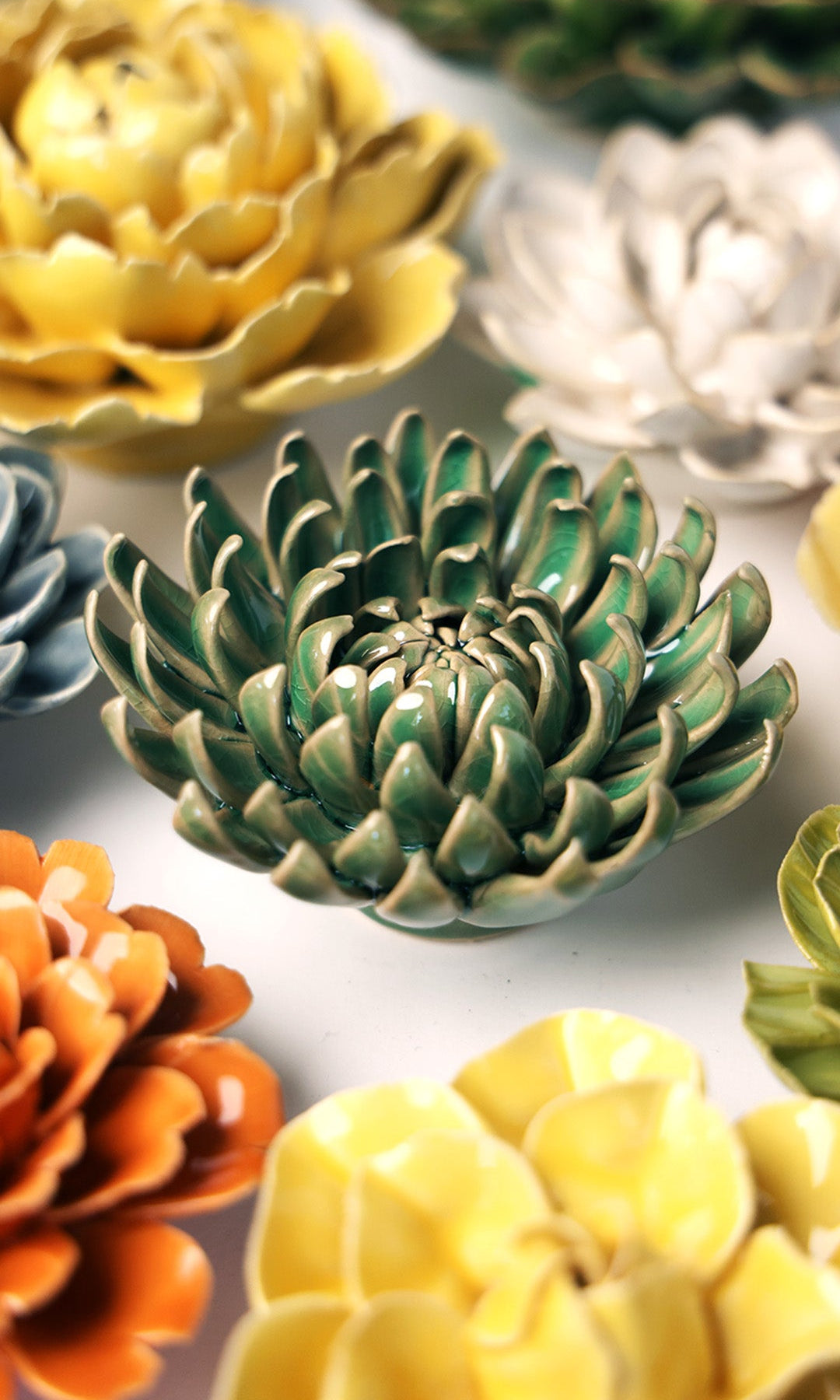 Jungle Green Pompom Mum ceramic wall flower styled on wall — English Garden — Chive Studio Toronto