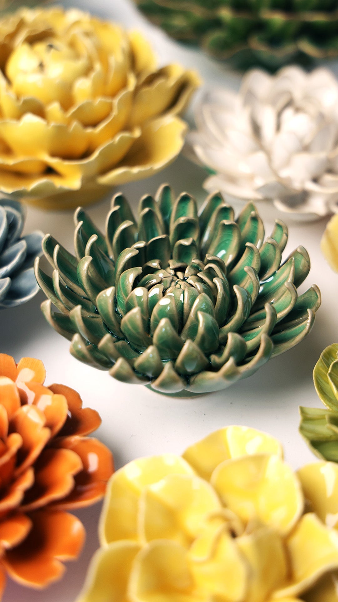 Jungle Green Pompom Mum ceramic wall flower styled on wall — English Garden — Chive Studio Toronto