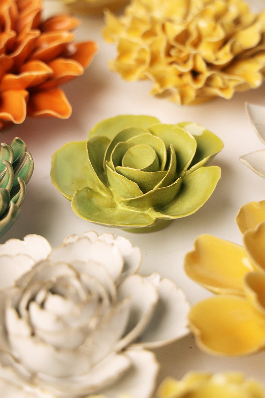 Chartreuse Elegance Ranunculus ceramic wall flower styled on wall — English Garden — Chive Studio Toronto