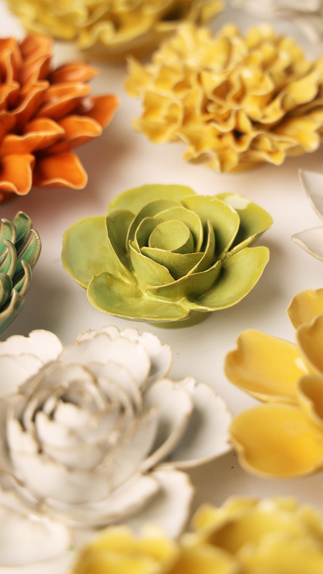 Chartreuse Elegance Ranunculus ceramic wall flower styled on wall — English Garden — Chive Studio Toronto