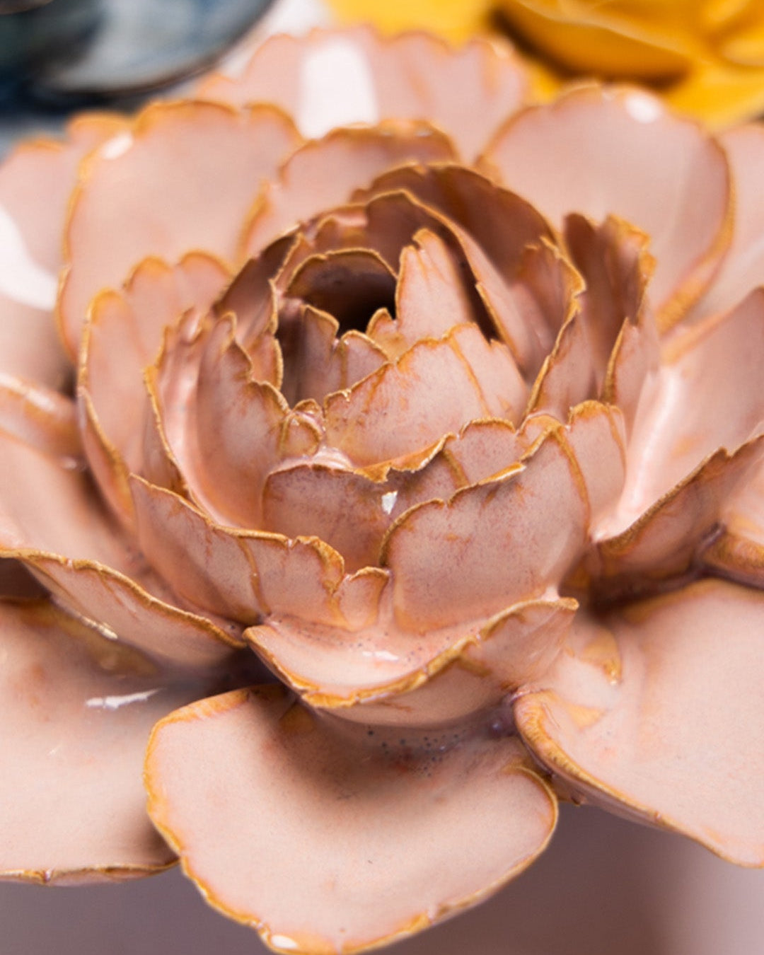 Rose Pink Camellia ceramic wall flower mounted on a wall — Chive Ceramics Studio