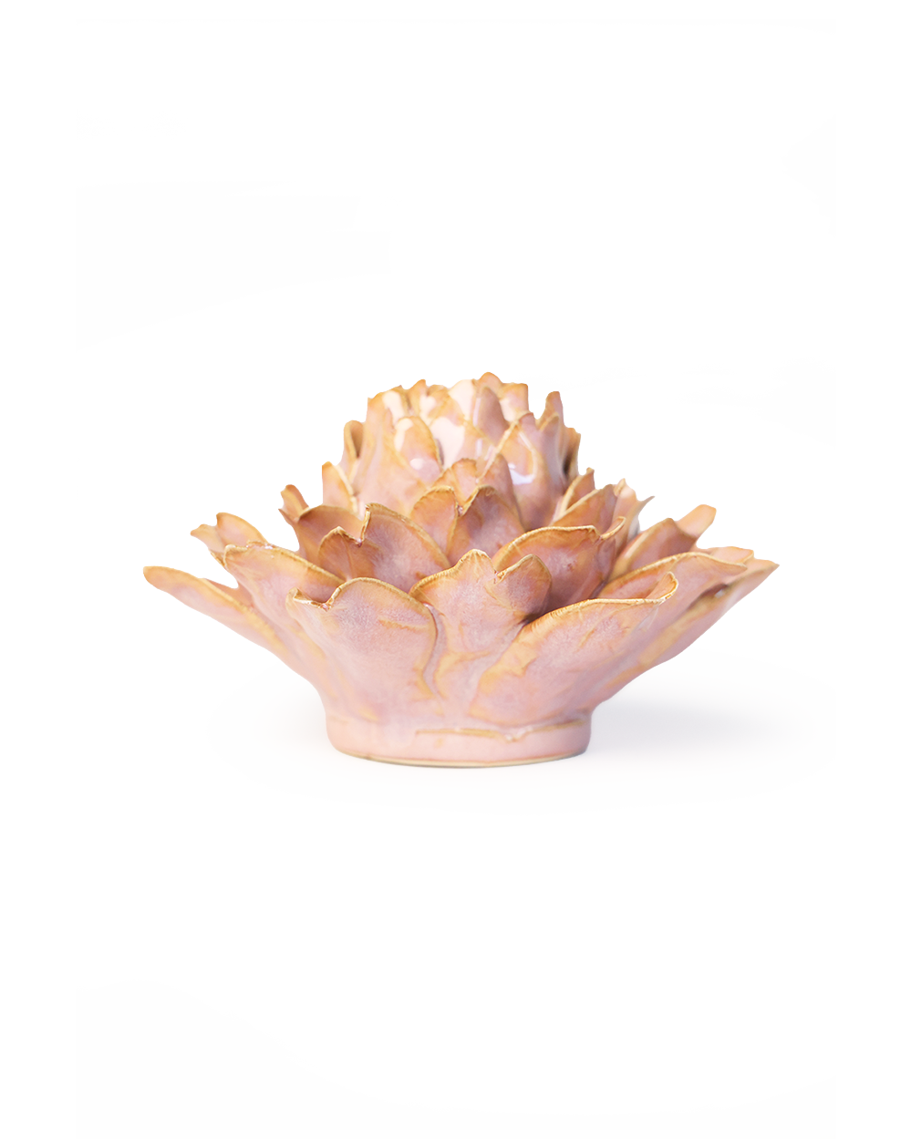 A small sculptural lotus flower vase or candle holder with layered petals, finished in a soft blush pink with metallic gold edging, photographed on a clean white background.