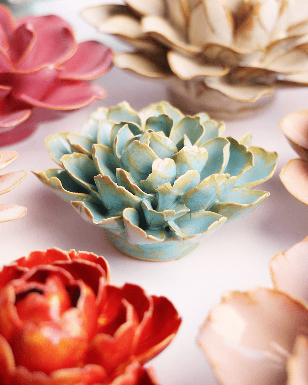 Robin's Egg Blue French Marigold mounted on an office wall, Chive Ceramics Studio