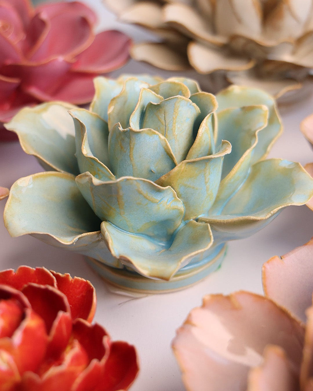 Robin's Egg Blue Stargazer Lily mounted on a living room wall, Chive Ceramics Studio