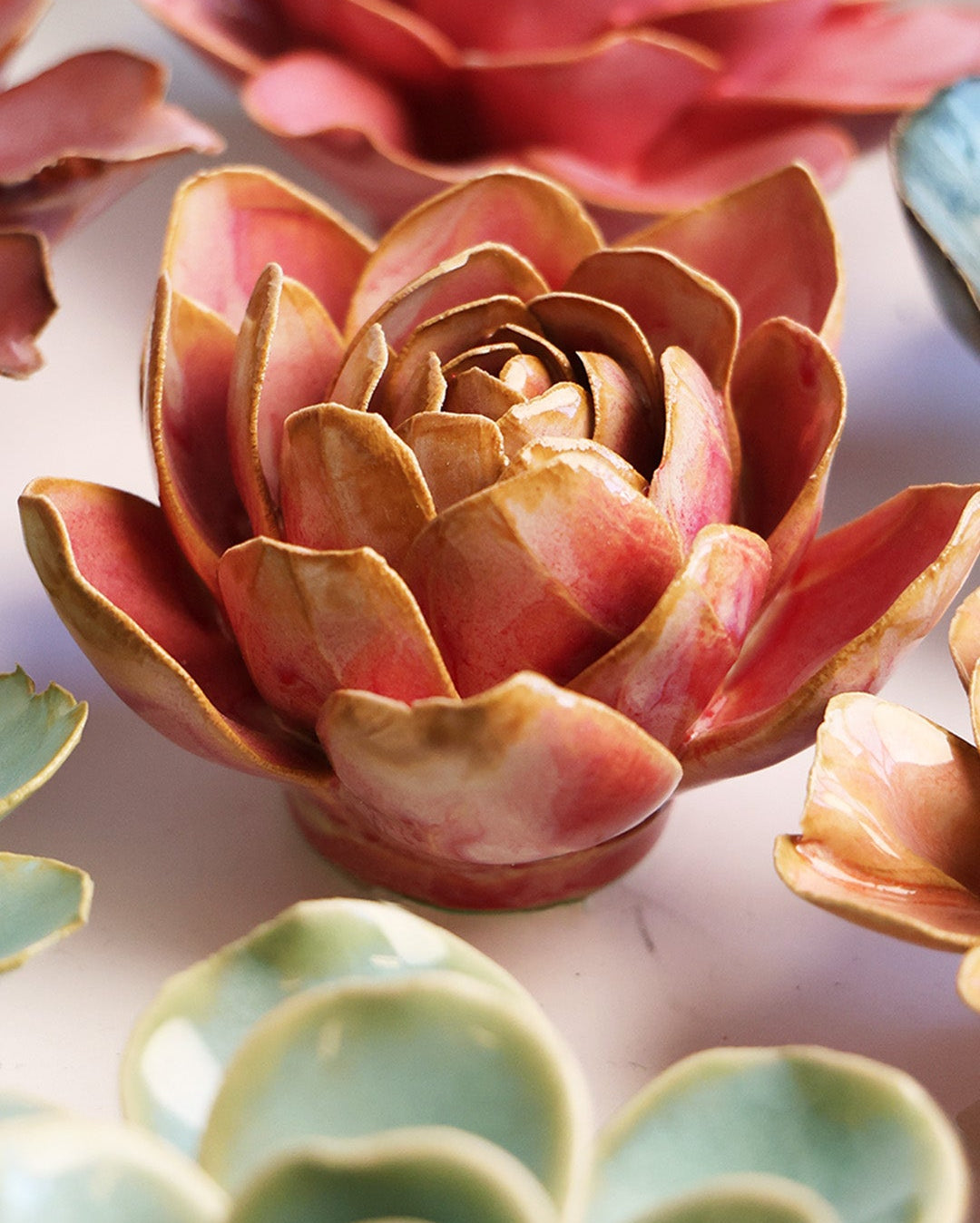 Rose Quartz Pink Narcissus mounted on a bedroom wall, Chive Ceramics Studio