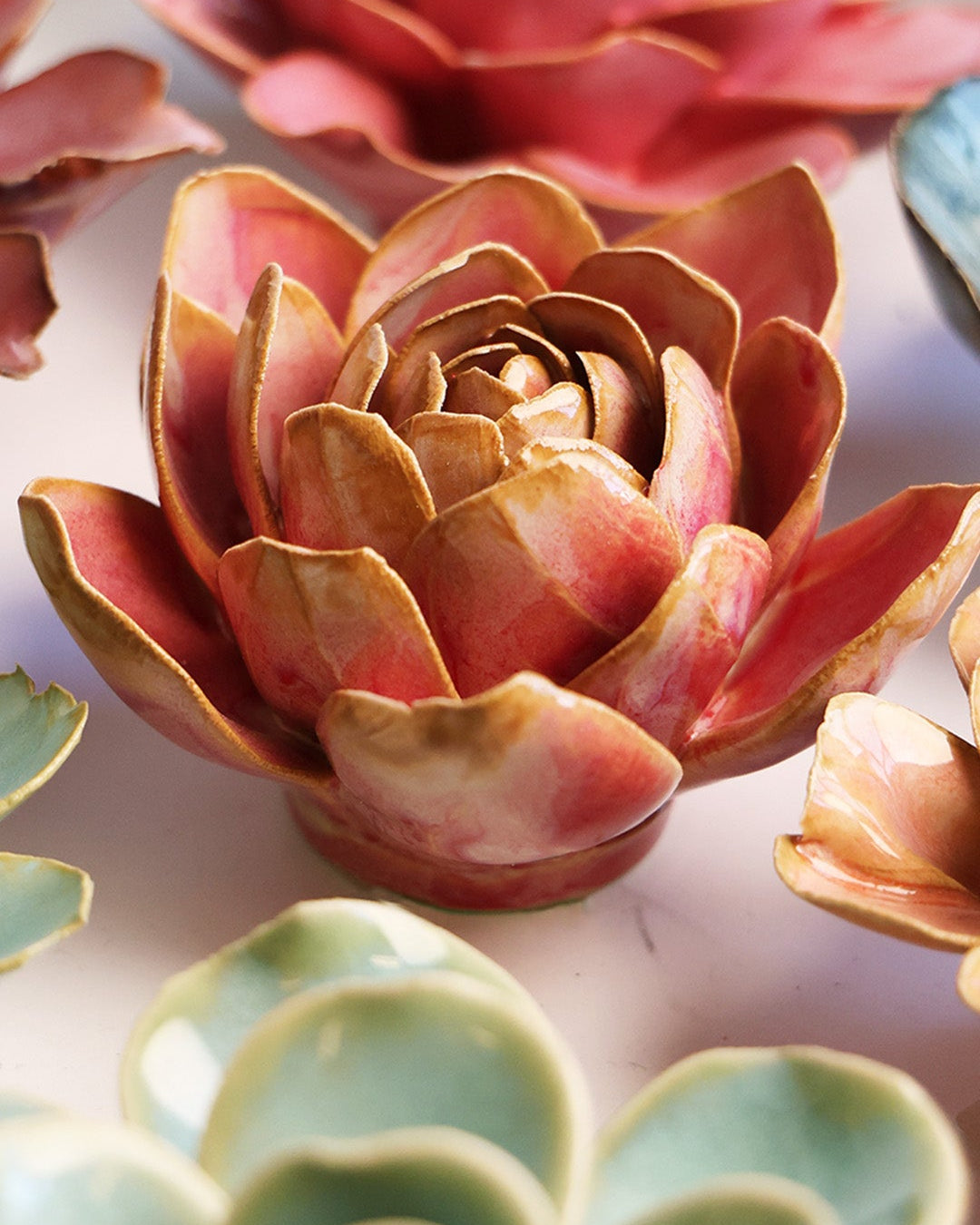 Rose Quartz Pink Narcissus mounted on a bedroom wall, Chive Ceramics Studio