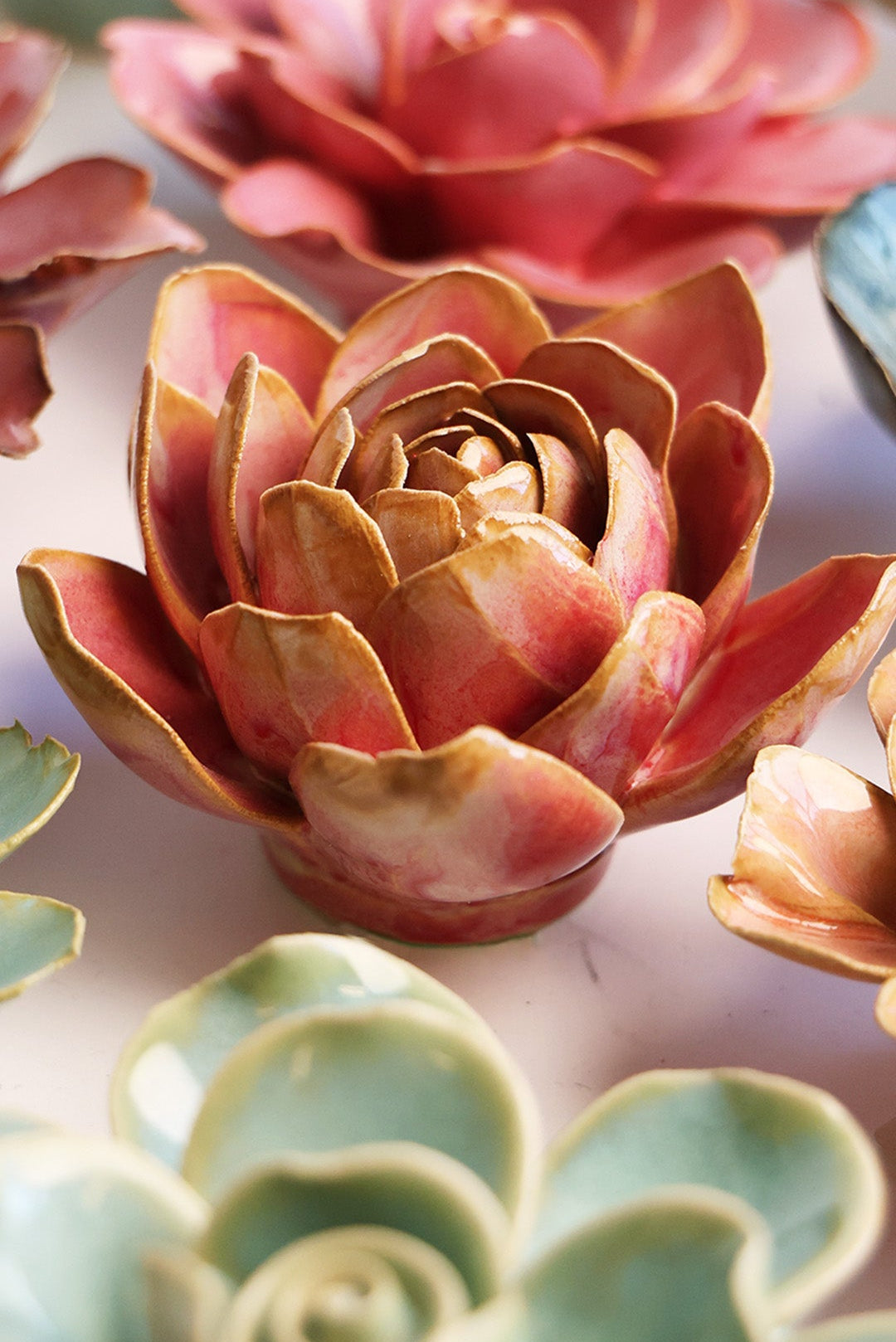 Rose Quartz Pink Narcissus mounted on a bedroom wall, Chive Ceramics Studio