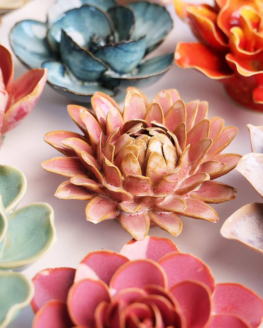 Rose Quartz Pink Strawflower mounted on a gallery wall, Chive Ceramics Studio