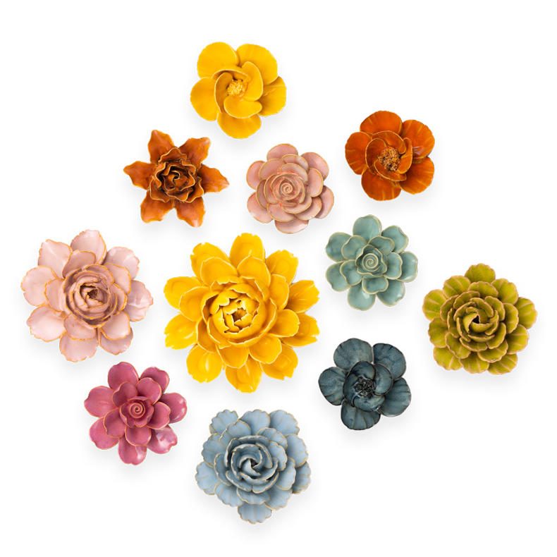 France Collection an assortment of mixed Ceramic wall flowers in orange, pink, blue, and yellow on transparent background - Chive Ceramics Studio