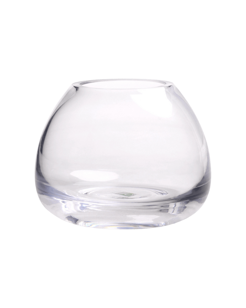 A clear glass bud vase with two flowers in it | Chive