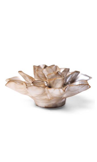 A sculptural lotus-shaped dish or candle holder made from natural mother-of-pearl shell, featuring iridescent beige and cream tones with subtle gold-brown highlights, set against a plain white background.