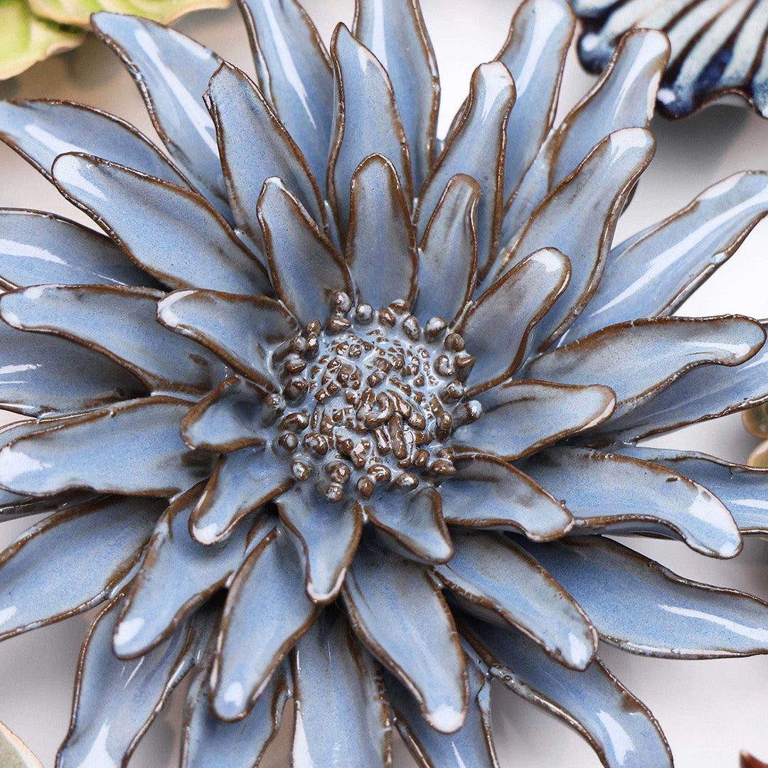 Blue Grey Gerbera Daisy ceramic wall flower styled on a white table with other flowers — Chive Studio