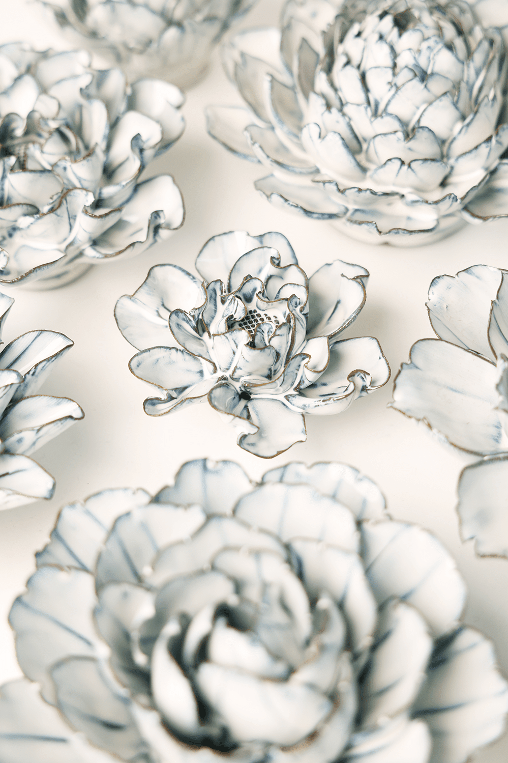 May Birth Flower - Hawthorn ceramic wall flower styled on wall — Birth Flower Collection — Chive Studio Toronto