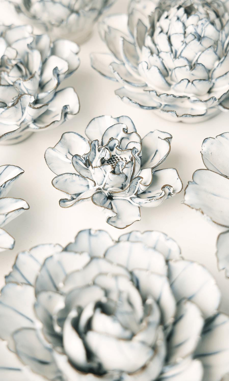 May Birth Flower - Hawthorn ceramic wall flower styled on wall — Birth Flower Collection — Chive Studio Toronto