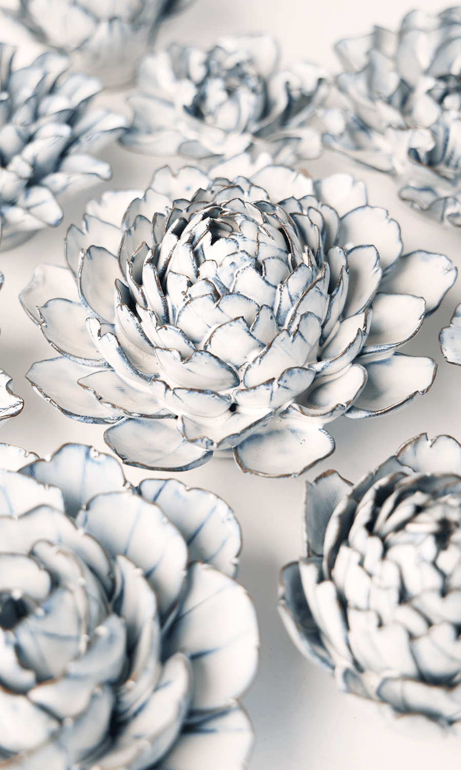 Blue White Hermione Peony ceramic wall flower styled on wall — Coastal Collection — Chive Studio Toronto