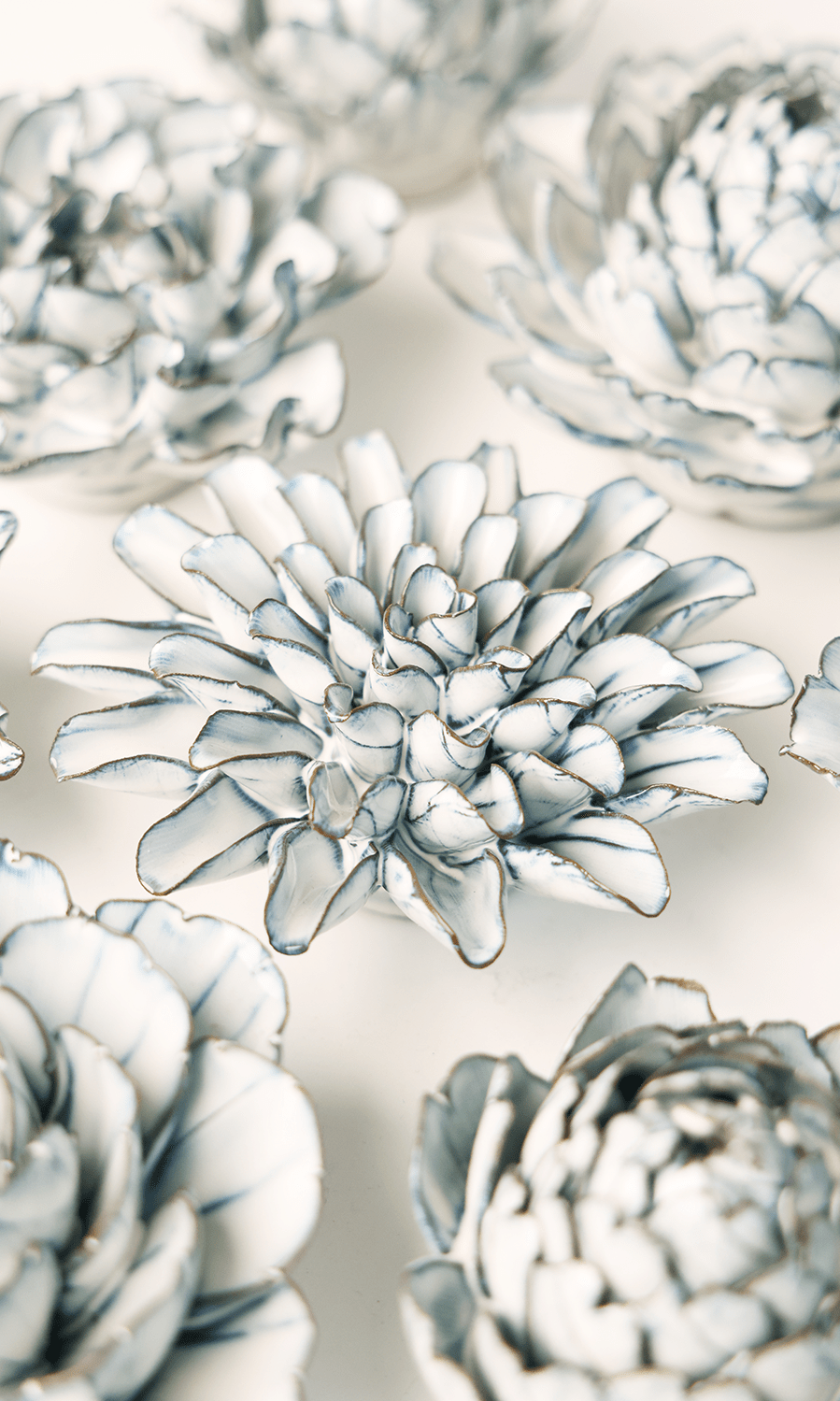 Blue White Lexi Cornflower ceramic wall flower styled on wall — Coastal Collection — Chive Studio Toronto