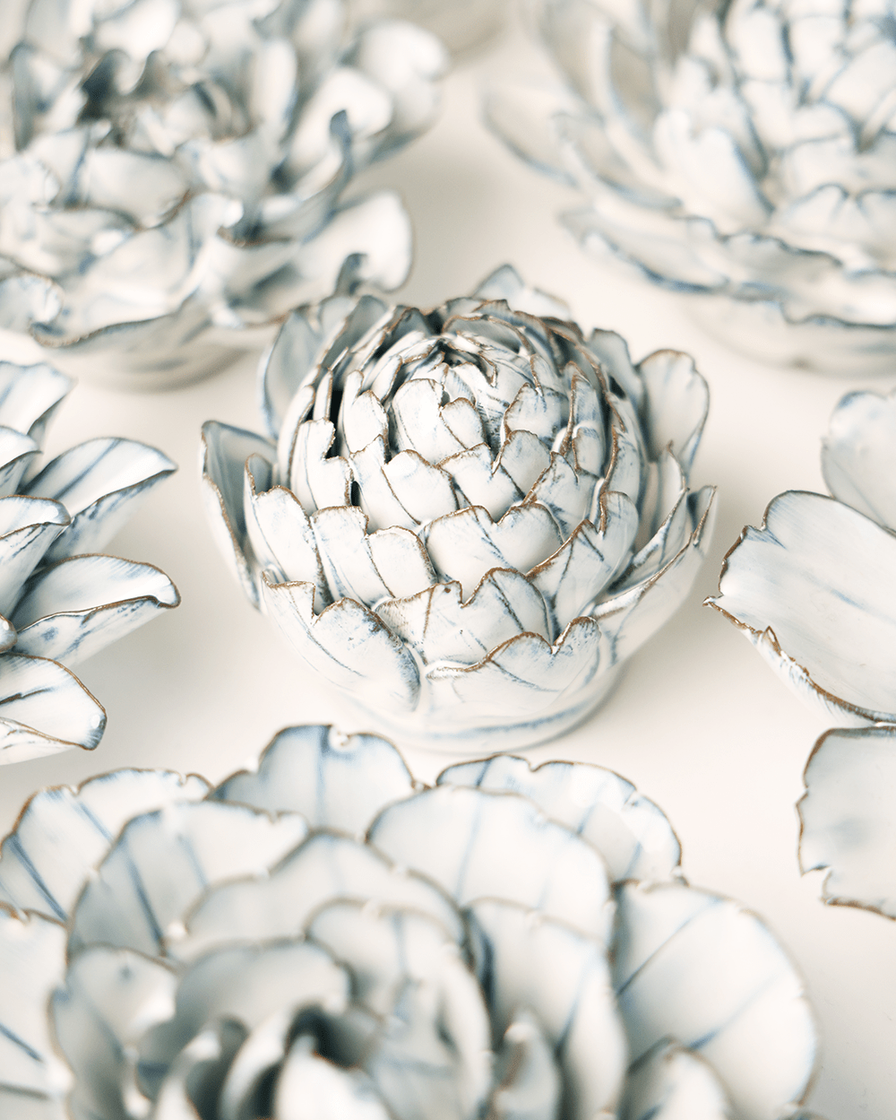 Blue White Queen Protea ceramic wall flower styled on wall — Coastal Collection — Chive Studio Toronto